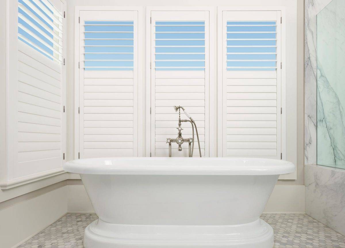 Palm Beach™ Polysatin™ Vinyl Shutters in a bathroom near Costa Mesa, California (CA)