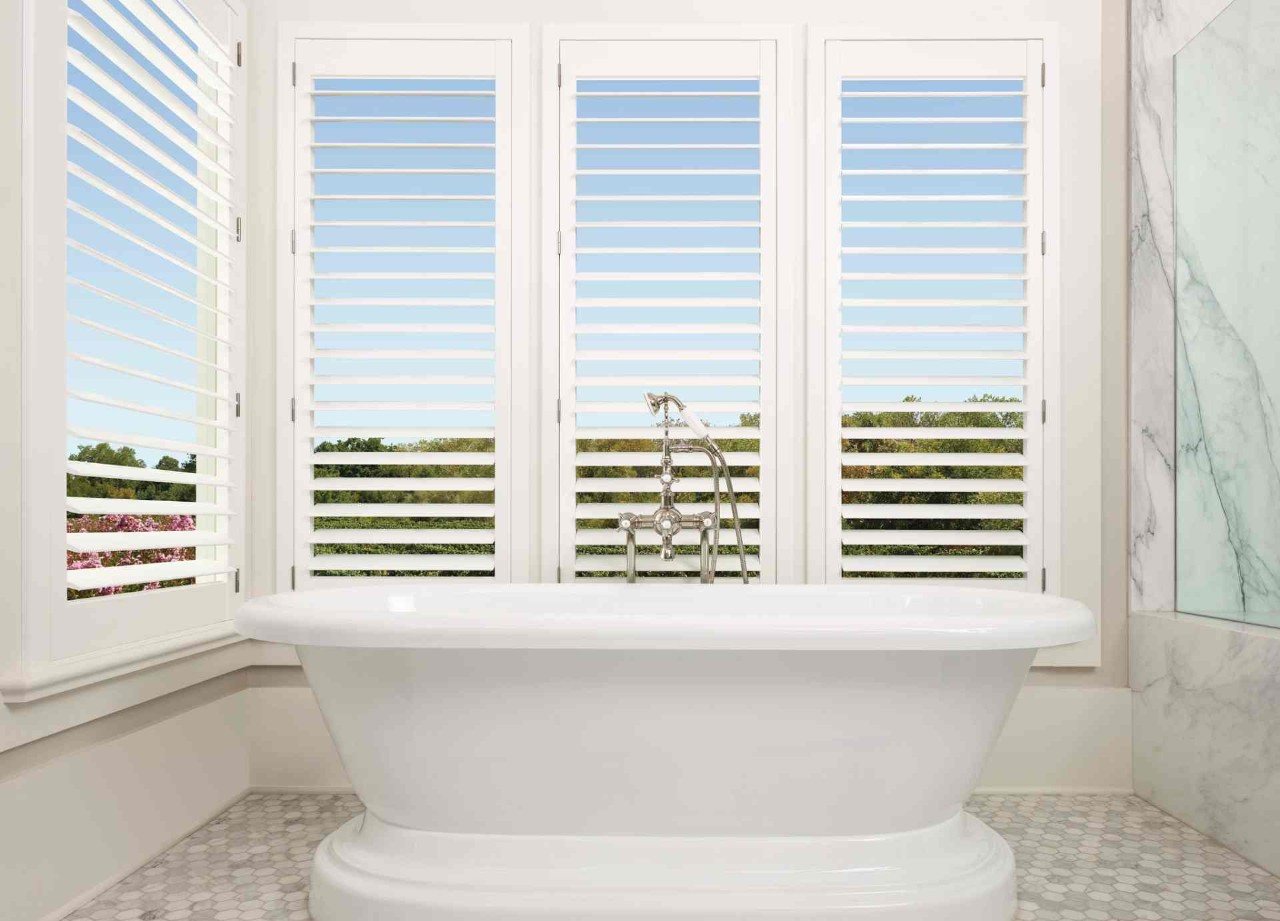 Hunter Douglas Palm Beach™ Polysatin™ Vinyl Shutters in a bathroom near Costa Mesa, California (CA) 
